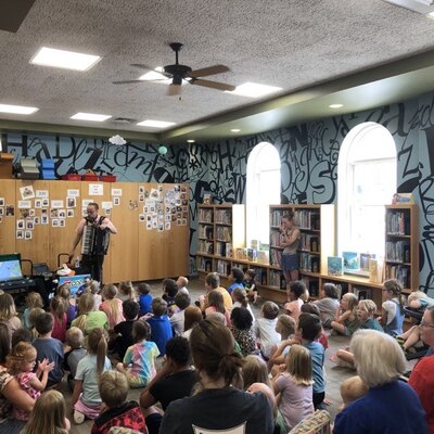A full house greets our summer library program kick-off performer!