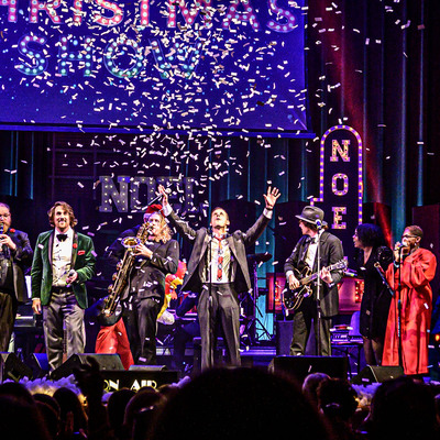 A full cast fills the stage and keeps the whole show moving.