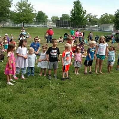 Kids and adults alike enjoy our programs, like The String Beans at the Mother's Day Market!