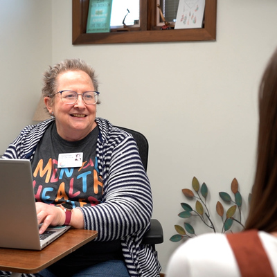 Marilyn Fronk, Access Clinician assists a new client through Same Day Access process.