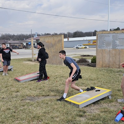 Cornhole boards downtown give people another reason to stay awhile, play together and spend more tim