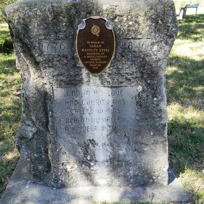 Cleaning the Sarah Keyes monument at Alcove Springs, KS