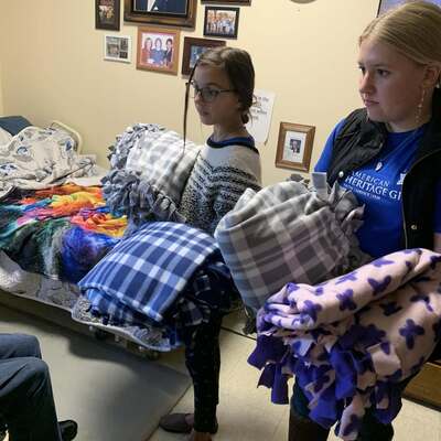 Delivering hand made blankets to nursing home
